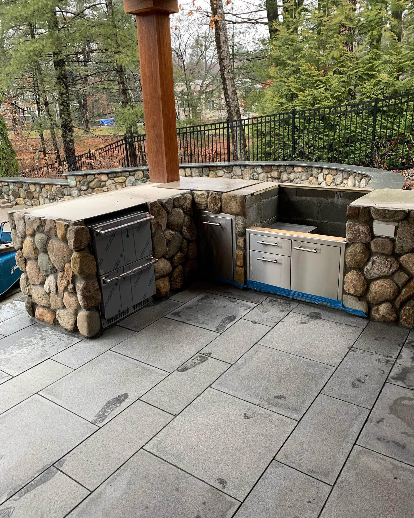 Fieldstone kitchen on a bluestone patio