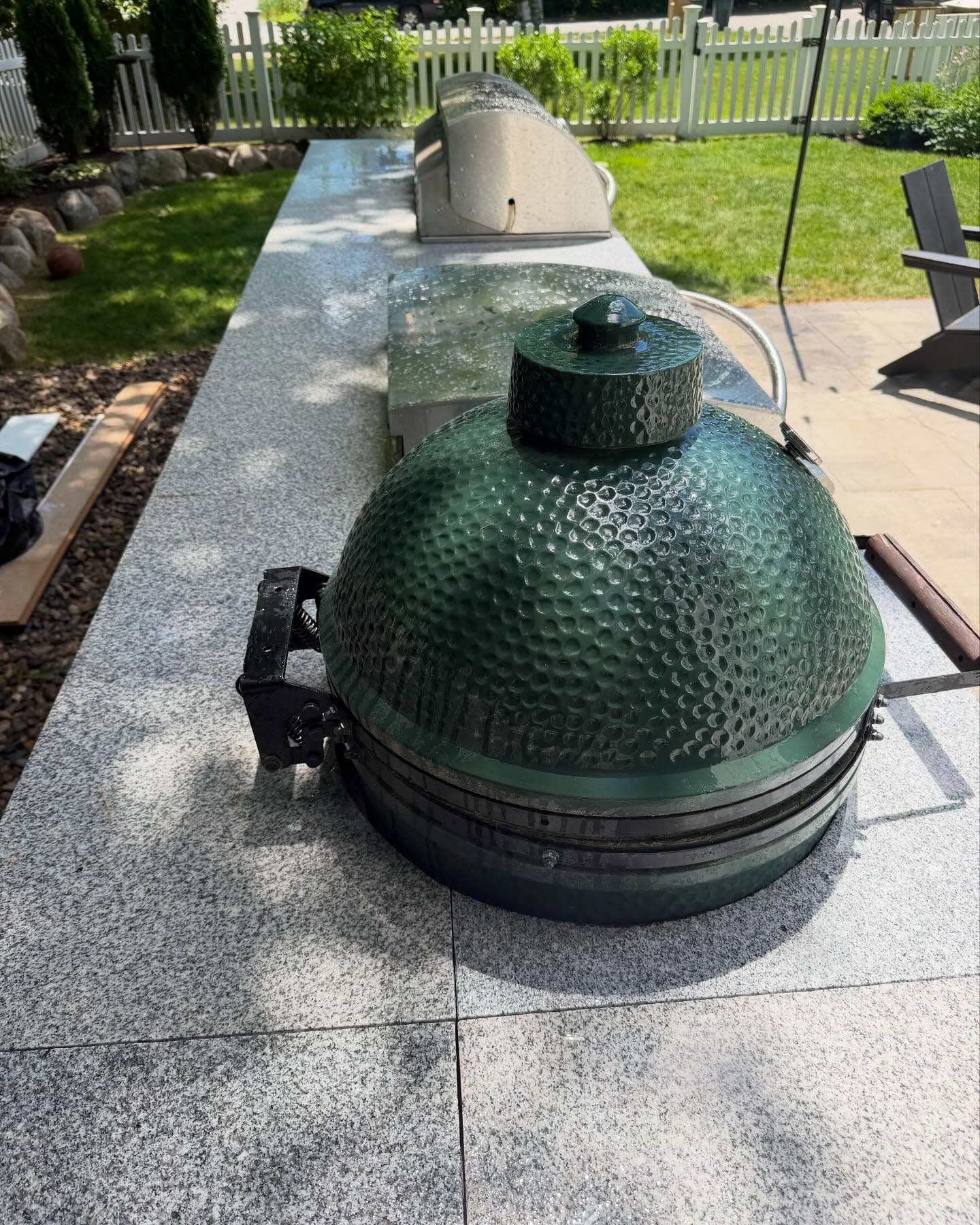 Granite outdoor counter with a kamado grill